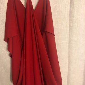 A red mini dress been worn once